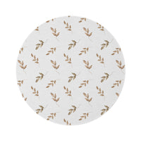 Linen Leaf round nursery rug on a baby room floor