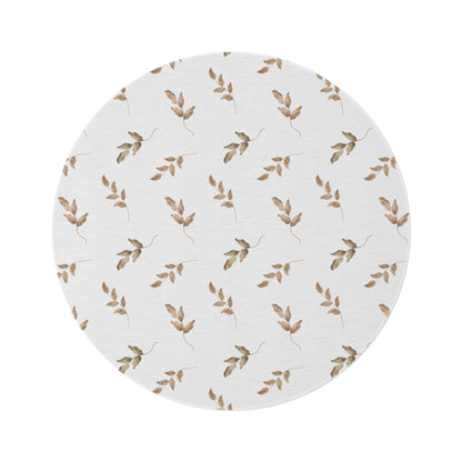 Linen Leaf round nursery rug on a baby room floor