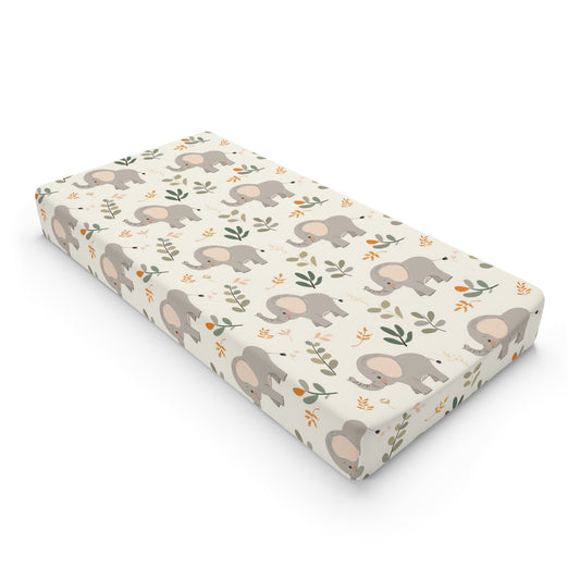 Little Elephants changing pad cover on a nursery changing table