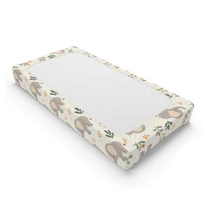 Changing pad cover with grey elephants and leaf sprigs