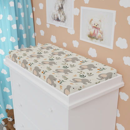 Little Elephants changing pad cover fitted over a contoured pad