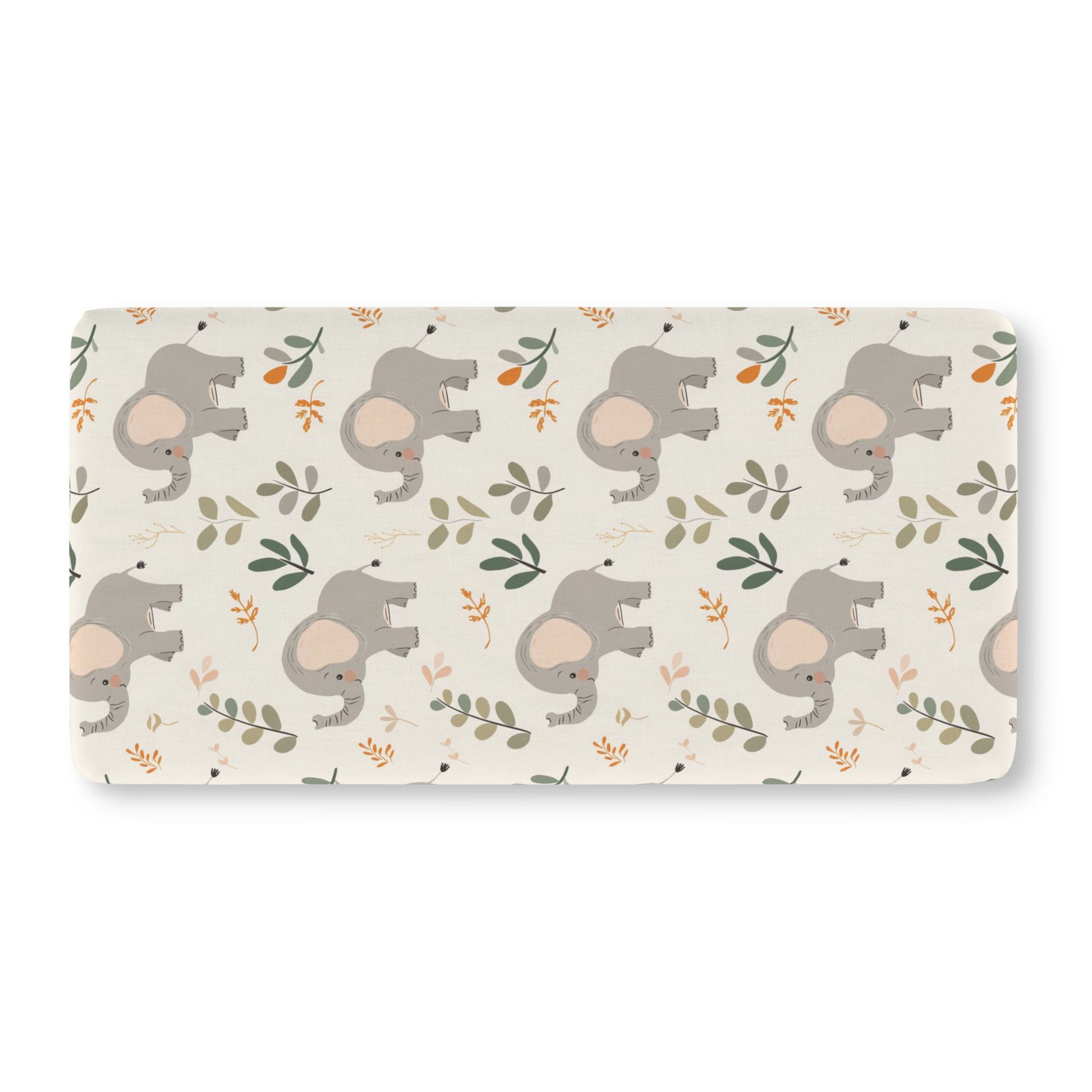 Fitted crib sheet with grey elephants and green leaves on cream