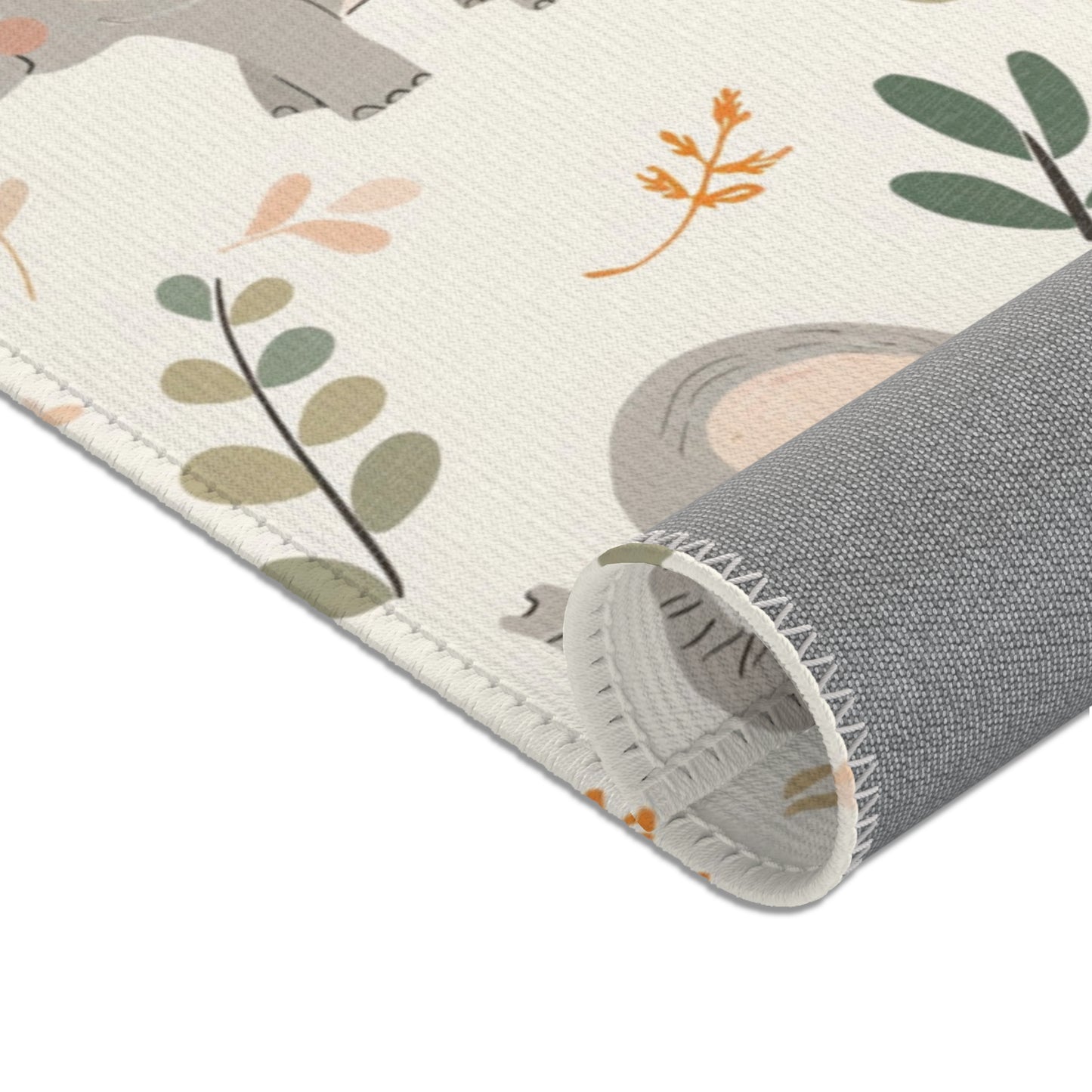 Corner detail of the Little Elephants nursery area rug