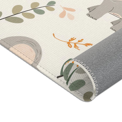 Nursery area rug in a grey, green and cream palette