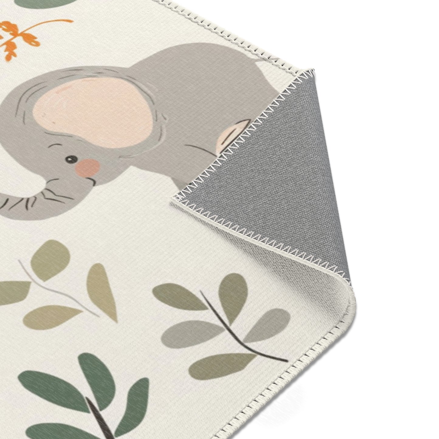 Little Elephants rug print detail in grey and sage