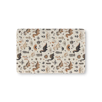 Meadow Dinosaurs fitted crib sheet on a nursery crib mattress