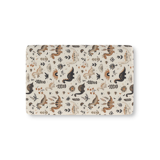 Meadow Dinosaurs fitted crib sheet on a nursery crib mattress