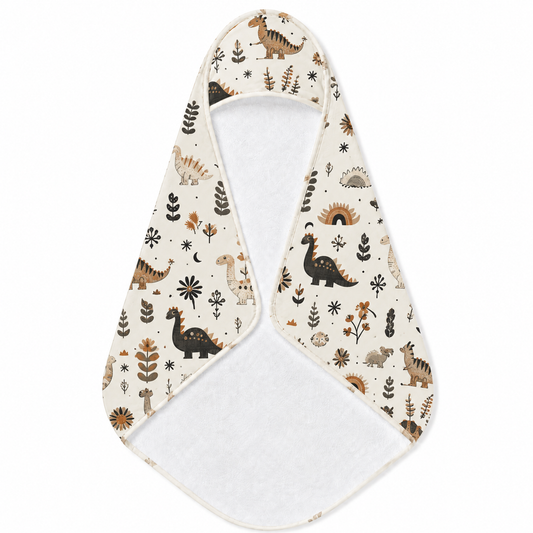 Meadow Dinosaurs hooded baby towel wrapped around a baby