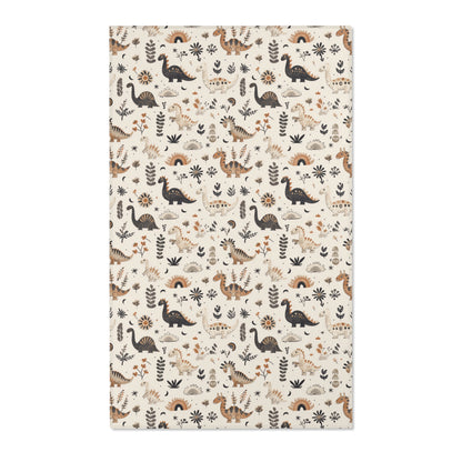 Dinosaur nursery area rug in charcoal, tan and ochre on cream