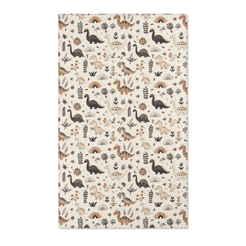 Dinosaur nursery area rug in charcoal, tan and ochre on cream