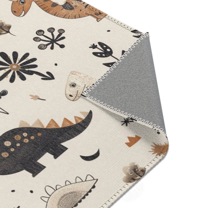 Meadow Dinosaurs rug print detail in charcoal and ochre