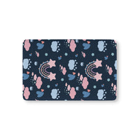 Midnight Rainbow fitted crib sheet on a nursery crib mattress