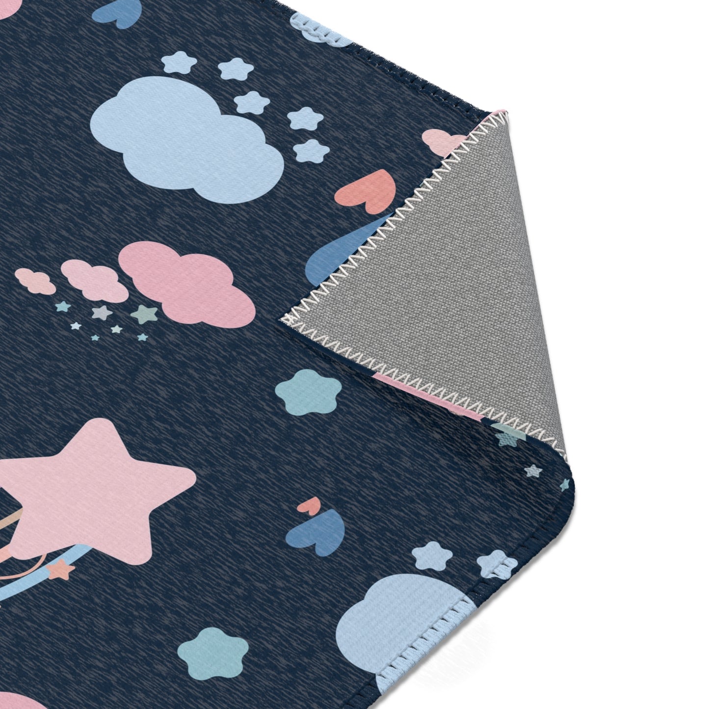 Nursery area rug printed edge to edge with pastel rainbows