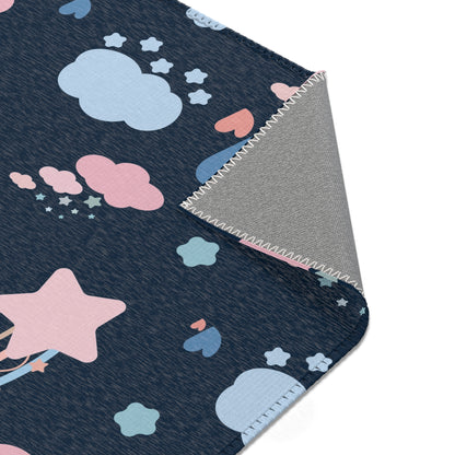 Nursery area rug printed edge to edge with pastel rainbows