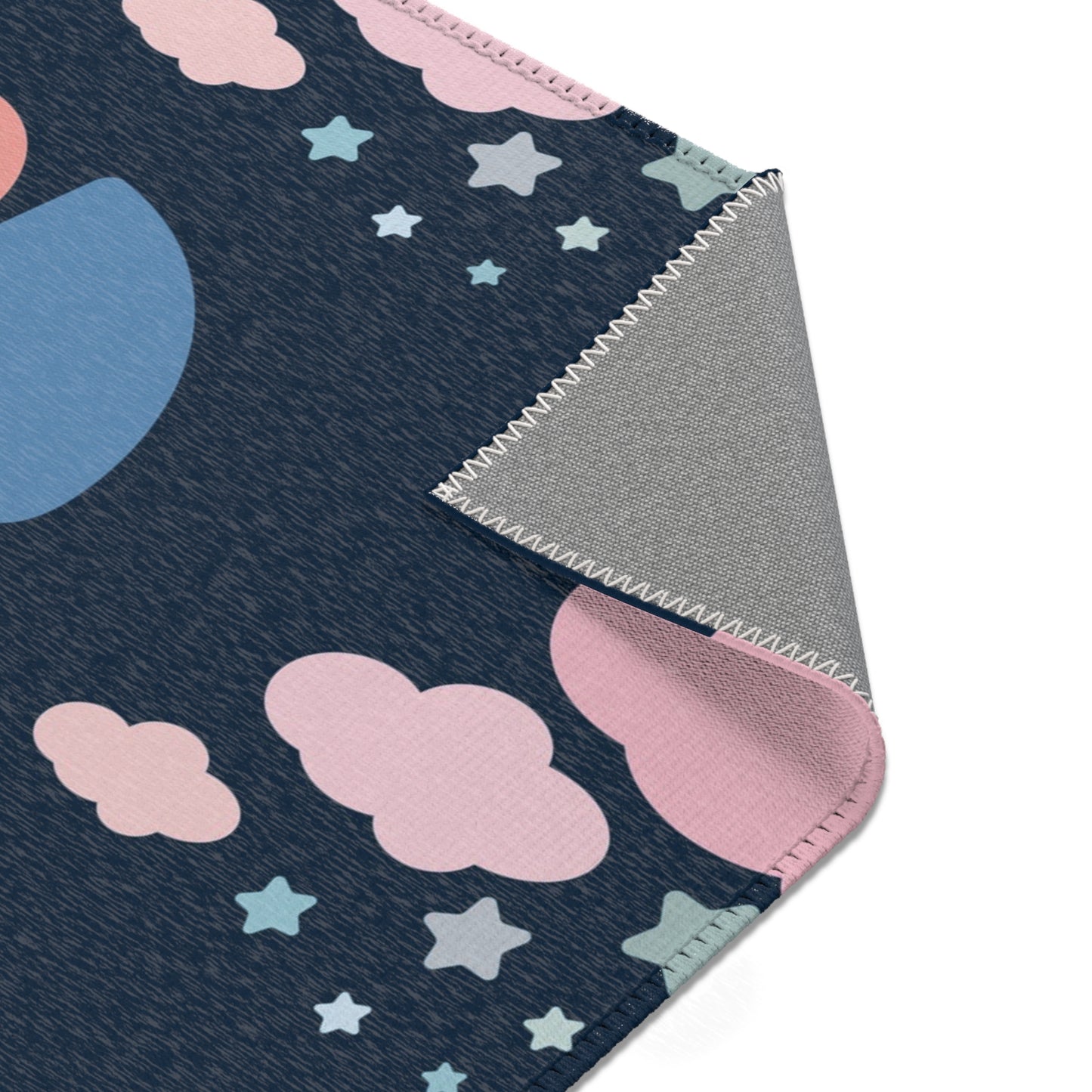 Navy rainbow rug for a nursery floor