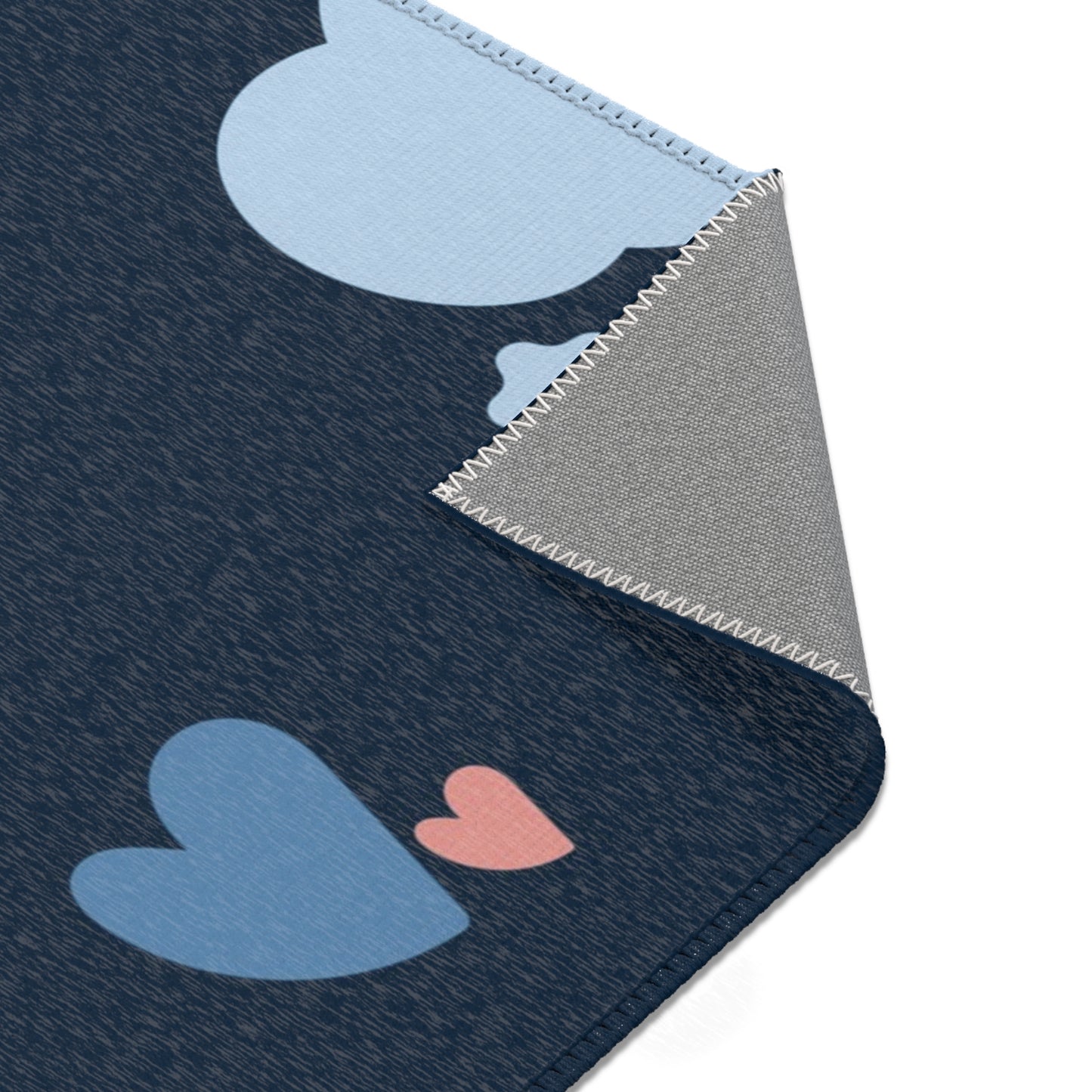 Midnight Rainbow rug print detail in pink and pale blue