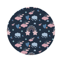 Midnight Rainbow round nursery rug on a baby room floor