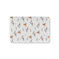 Moonlit Dreams fitted crib sheet on a nursery crib mattress