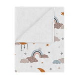 Moonlit Dreams minky baby blanket draped over a crib