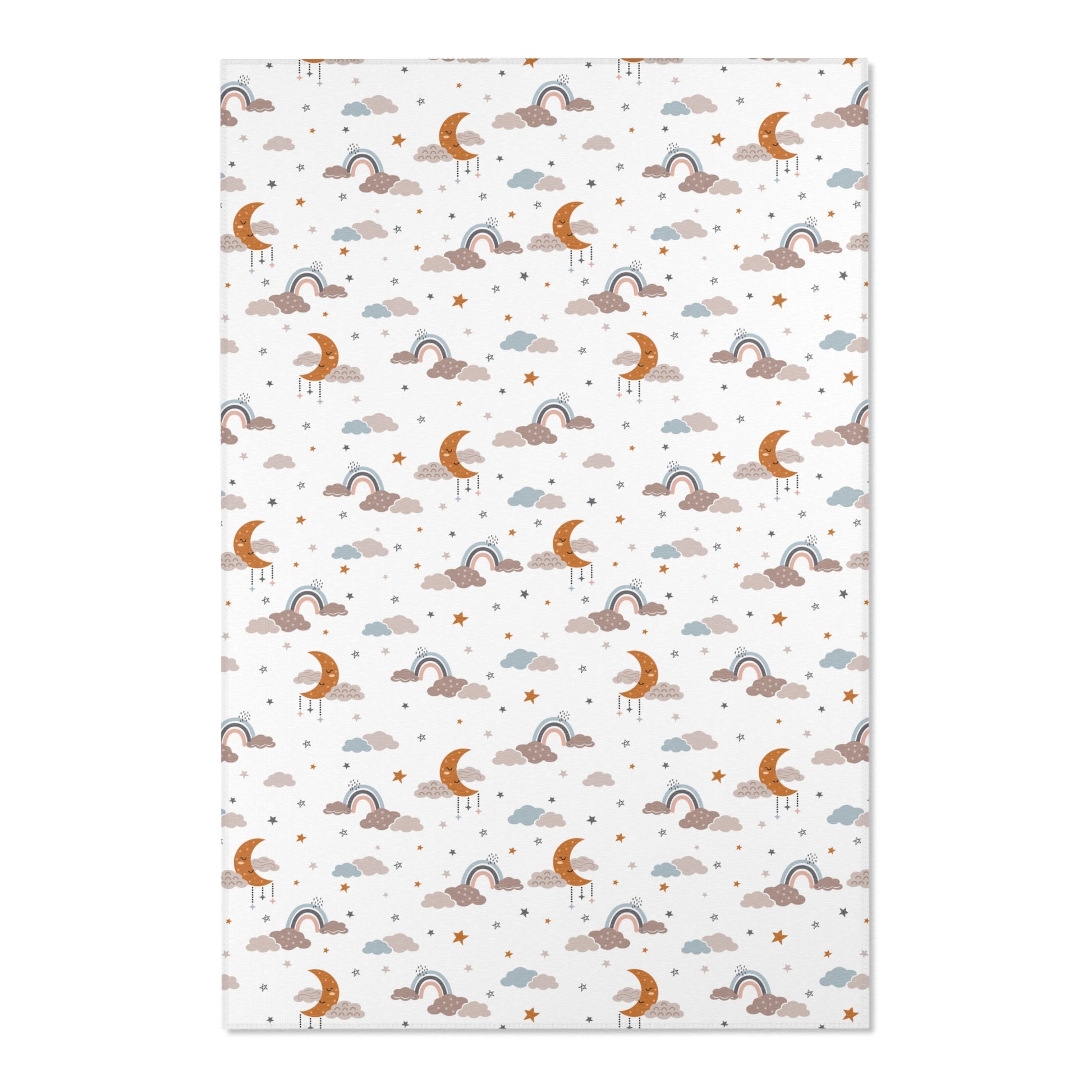 Close detail of the sleeping moons on the nursery area rug