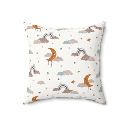 Close detail of the moon and cloud print on the faux suede pillow