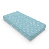 Nautical anchor changing pad cover on a nursery changing table