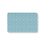 Nautical anchor fitted crib sheet on a nursery crib mattress