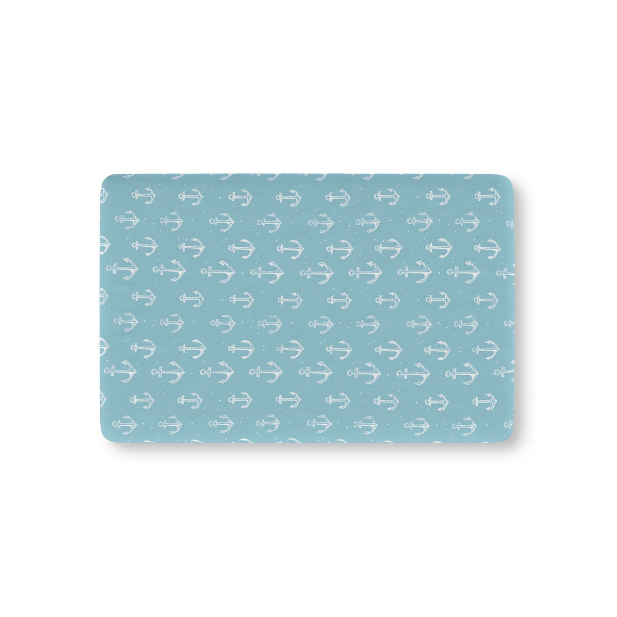 Nautical anchor fitted crib sheet on a nursery crib mattress