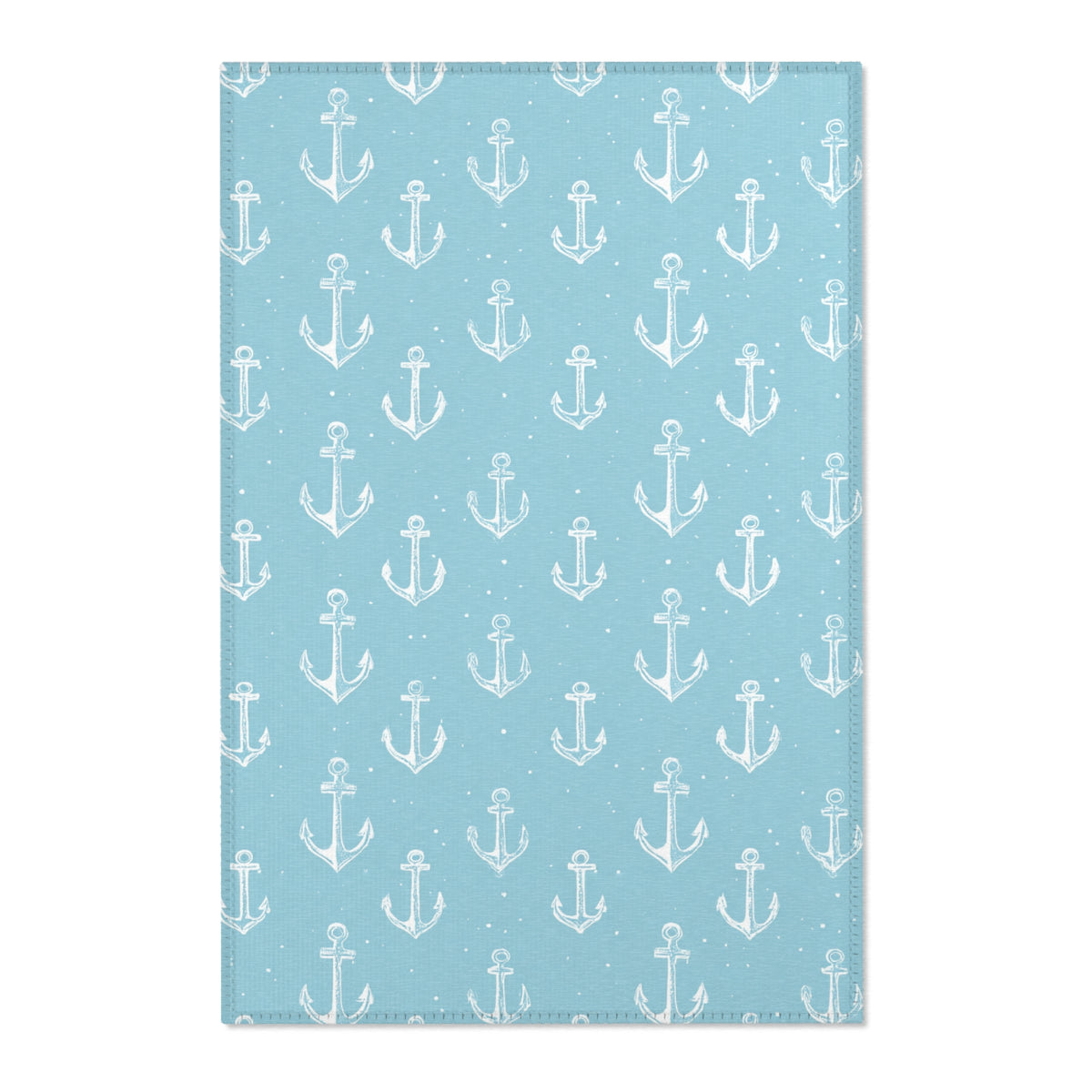 Nautical anchor nursery area rug in a coastal baby room