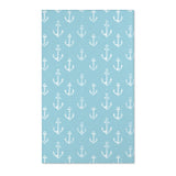 Rectangular teal anchor nursery rug shown from above