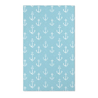 Rectangular teal anchor nursery rug shown from above