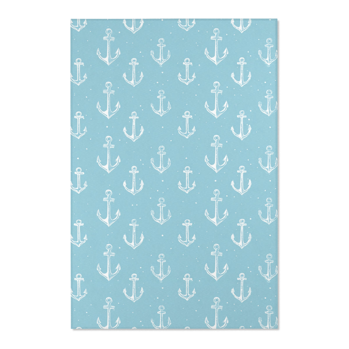 Close-up of the hand-drawn anchor print on a nursery rug