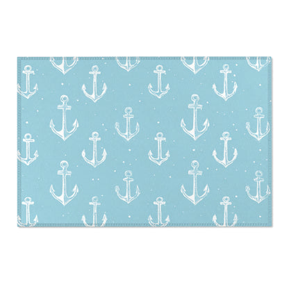 Washable nautical anchor area rug under a nursery crib