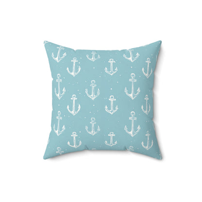 Nautical anchor cushion shown against a neutral nursery wall