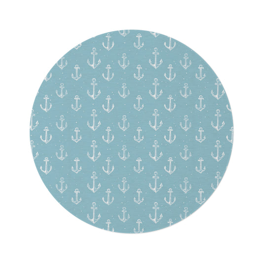 Nautical anchor round nursery rug on a baby room floor