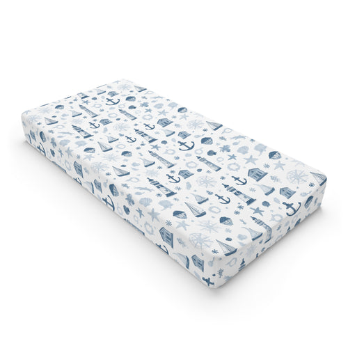 Nautical changing pad cover with lighthouses and sailboats in navy
