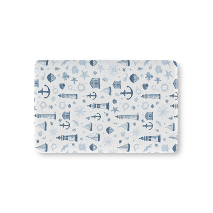 Nautical fitted crib sheet with lighthouses and anchors in navy