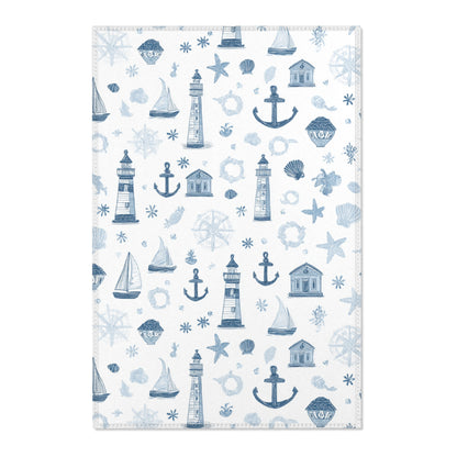 Nautical nursery area rug in a baby boy bedroom