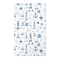 Rectangular navy nautical nursery rug shown from above