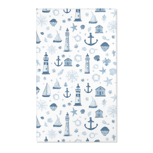 Rectangular navy nautical nursery rug shown from above