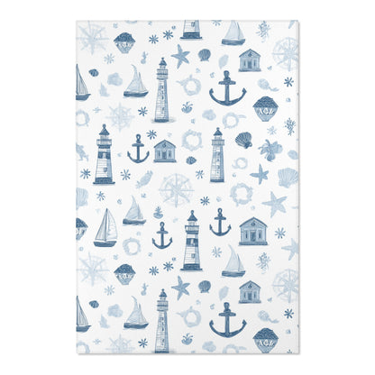 Close-up of the sketched nautical print on a nursery rug