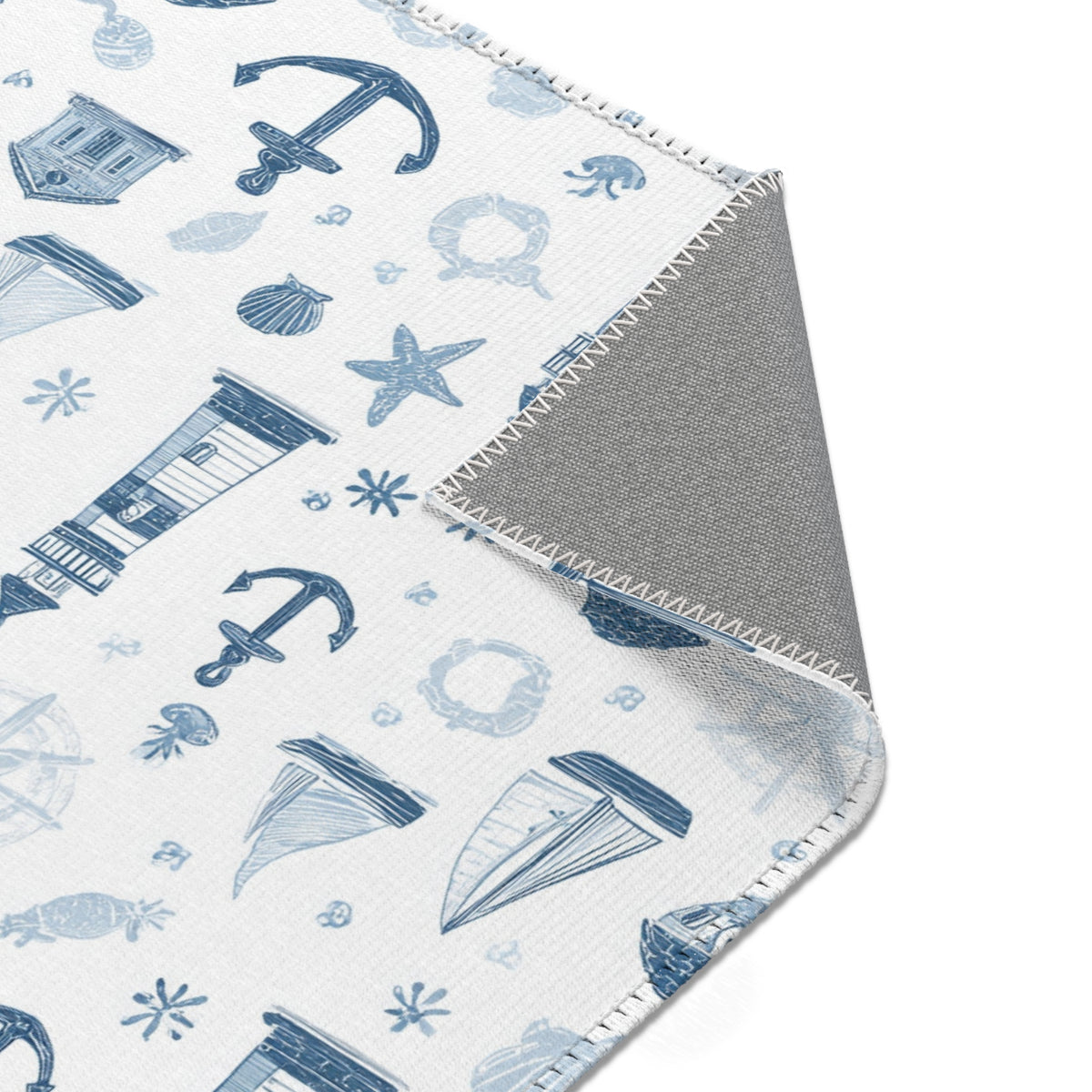 Nautical area rug styled with nursery furniture