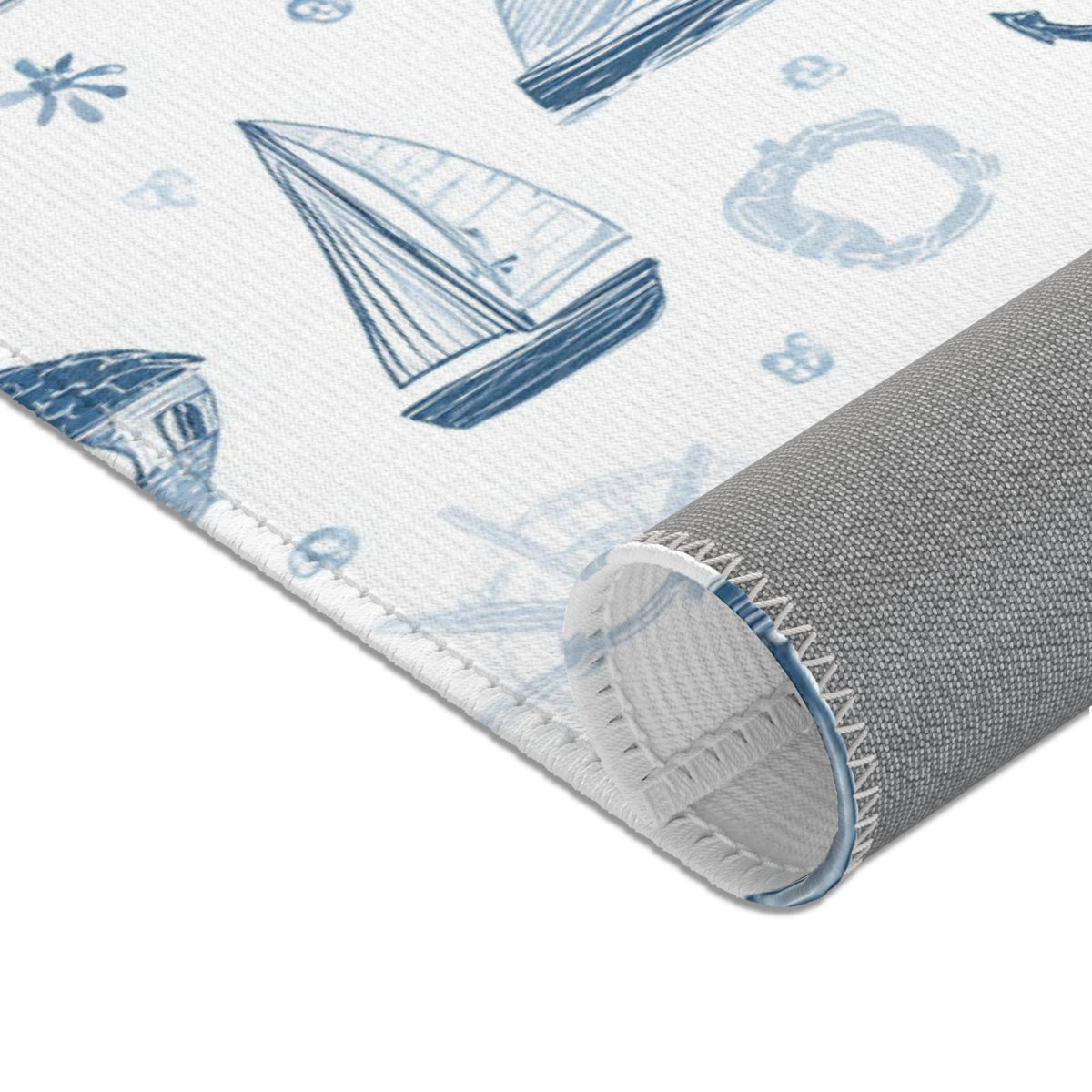 Nautical print baby room rug in a styled nursery
