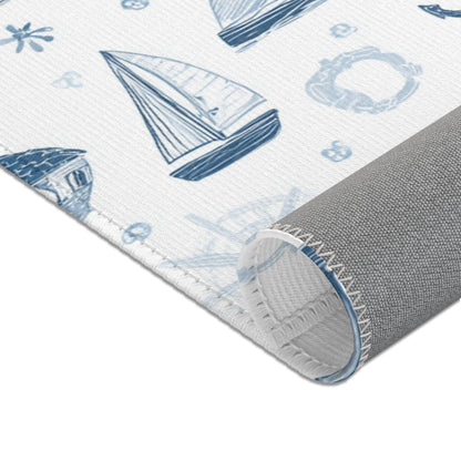 Nautical print baby room rug in a styled nursery