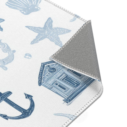 Navy nautical rug on a light wood floor