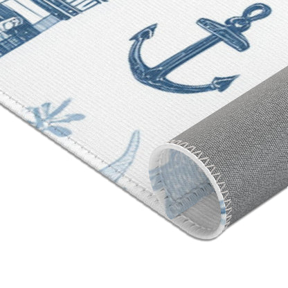 Nautical area rug in a small baby boy room