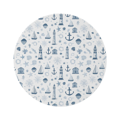 Nautical round nursery rug on a baby boy bedroom floor