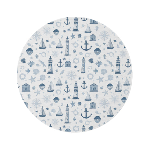 Nautical round nursery rug on a baby boy bedroom floor