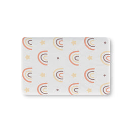 Peach Rainbow fitted crib sheet on a nursery crib mattress