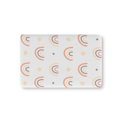Peach Rainbow fitted crib sheet on a nursery crib mattress